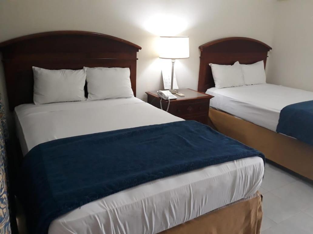 Hotel Novus Caoba Esperanza Eksteriør bilde